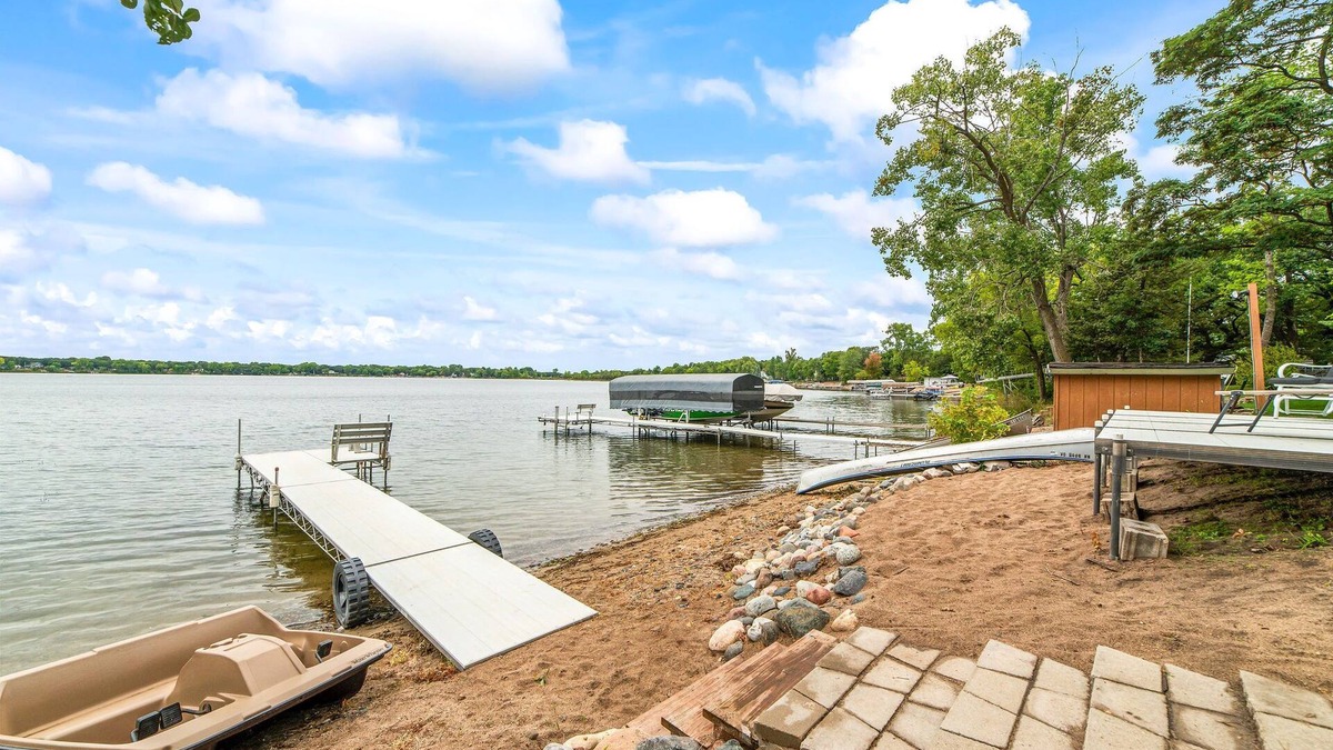 Big Lake Cabin | Sunset Retreat Lake Home - Pedal Boat, Canoe & Kayak Included