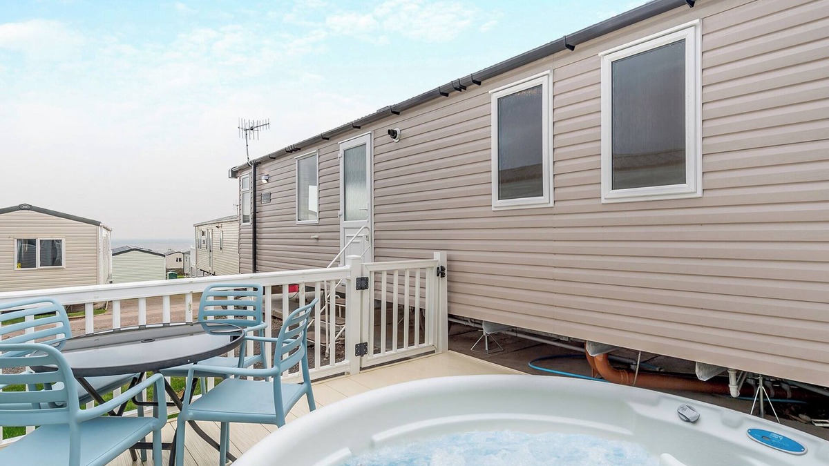 Otterton House | Super 12ft-wide luxurious caravan with one double and two twin.