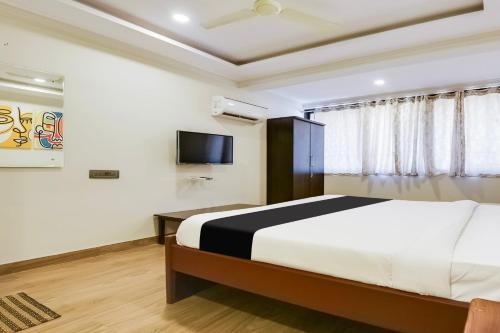 Holy Cross Colony Hotel | Super Hotel O Dabolim Near Goa International Airport