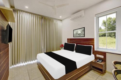 Dharwad Hotel | Super Townhouse Oak Dharwad formerly Rising Resort & Spa