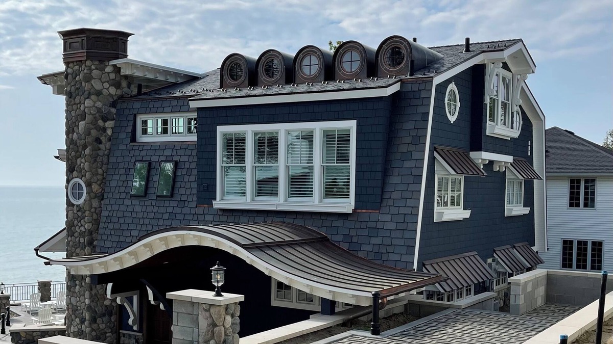 Macatawa House | Sweet Caroline . Lake MI Waterfront . Private Beach . Elevator . Sleeps 14