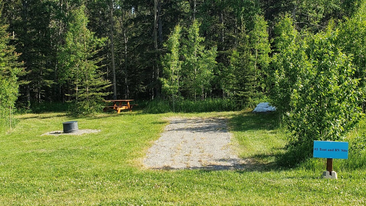 Sundre RV Rental | Tent and RV site on the James River at Stark Ranch Resort Site #1