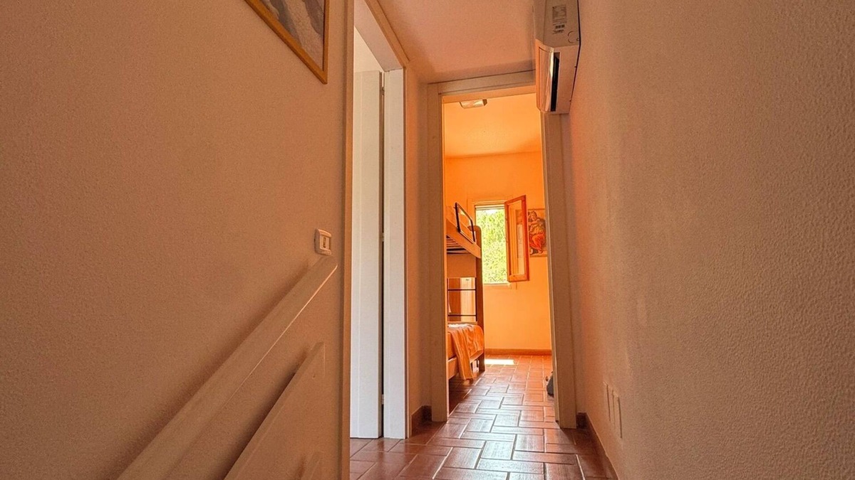 Acaya Apartment | The apartment is developed on two levels within a tourist village