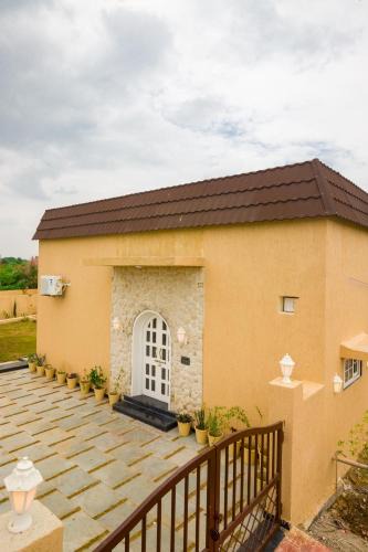 Dabok Villa | The Bliss Nestlewood 2-BHK Villa With Private Pool, Lush Garden & Poolside Gazebo