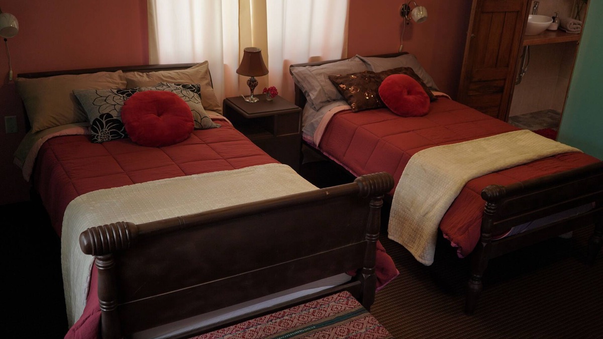 Huayllabamba House | The Corner with a Flower Balcony and Panoramic View.