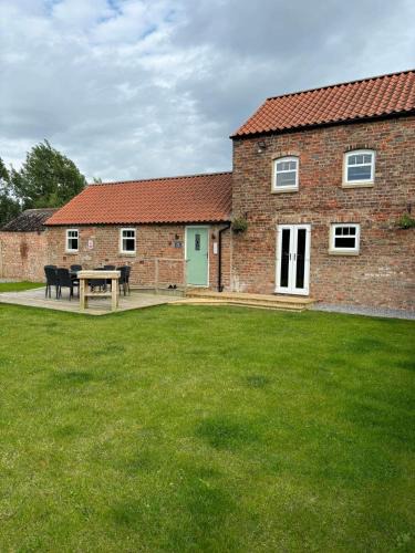 Low Catton House | The Dairy, Field House Farm, countryside cottage near York