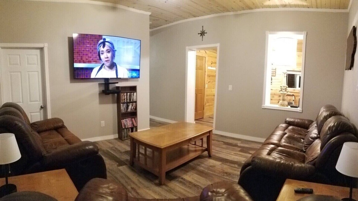 Guttenberg House | “The Depot” 2bedroom “3beds” 1 bath home. Outdoor party area with tv