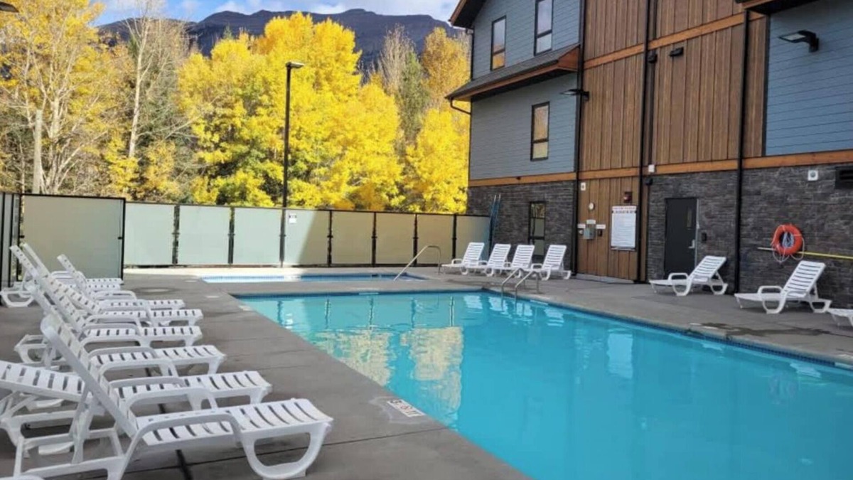 Dead Man's Flats Apartment | The Emerald Mountain Getaway w/Pool, hot tub and fitness room.