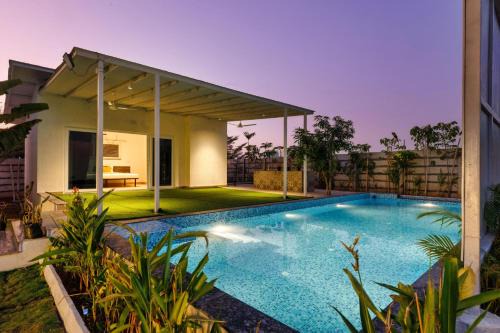 Bhongir Villa | The Farmstays JF PoolBasketball Court