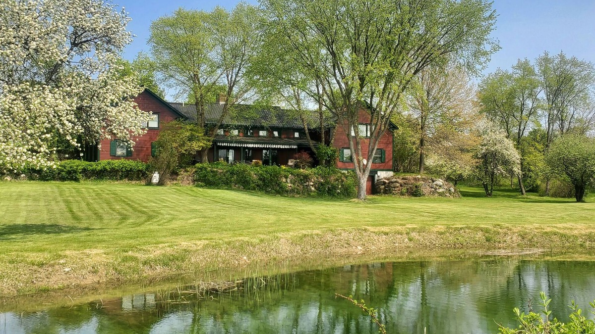 Brandon House | The Old Orchard Home surrounded by a small apple orchard, large meadows, and a private pond