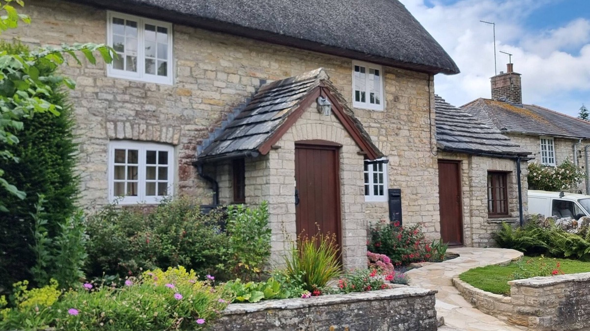 Church Knowle Apartment | The Old Post Office, annex with bedroom, onsuite and lounge with kitchenette.