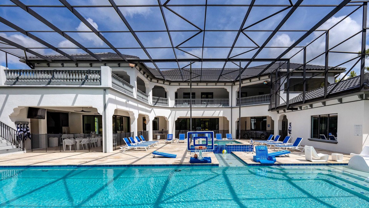 Reunion Villa | The One | 12 Bed, South-Facing Screened-In Pool, Theater Room, 2 Games Rooms & Gym