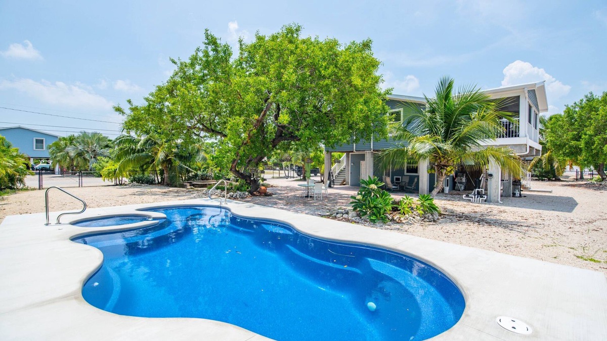 Breezeswept Beach Estates House | The Orchid House, 5 bed/2bath Canal Front Home, Ramrod Key