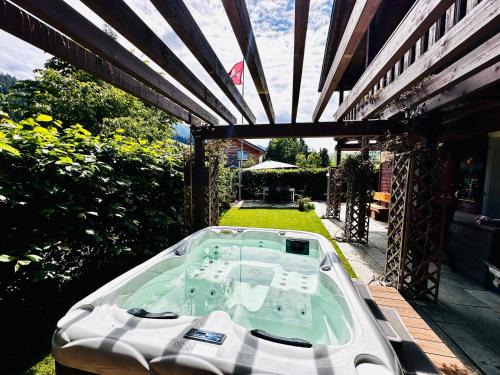 Wirzweli Apartment | The Swiss Paradise 2 Apartment with Garden, Whirlpool, and Mountain Panorama