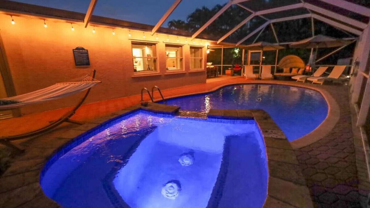 Greenacres Villa | The Utopia Resort Heated Pool Spa Waterfall BBQ Studio and more Hosted by Relaxtay