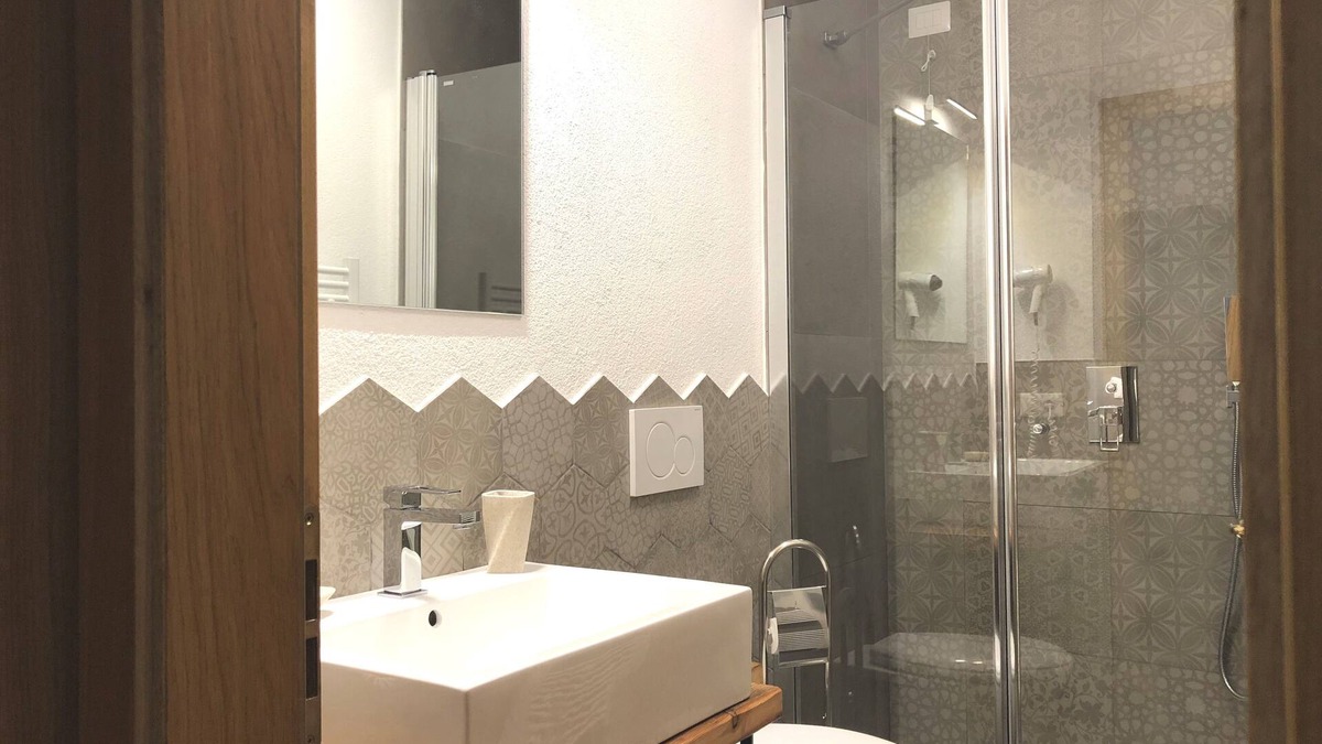 Molveno Apartment | THIRD FLOOR APARTMENT WITH LARGE BALCONIES