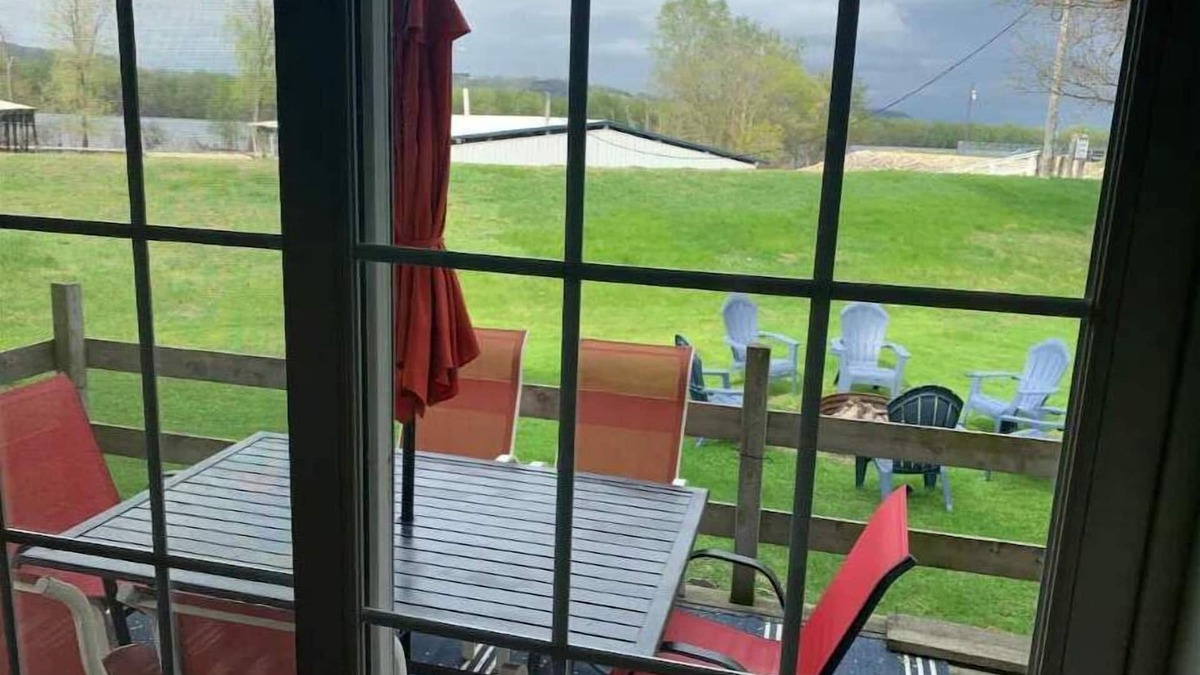 Marshland Apartment | This AMAZING river getaway is PERFECT for YOU! Private deck, grill & fire pit!