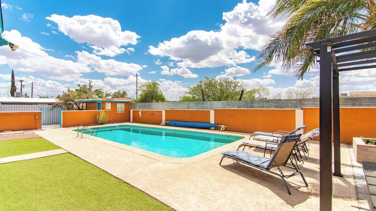 The Garden District House | This centrally located 3 bedroom 2 bathroom features a full size pool and electric vehicle charging on site.