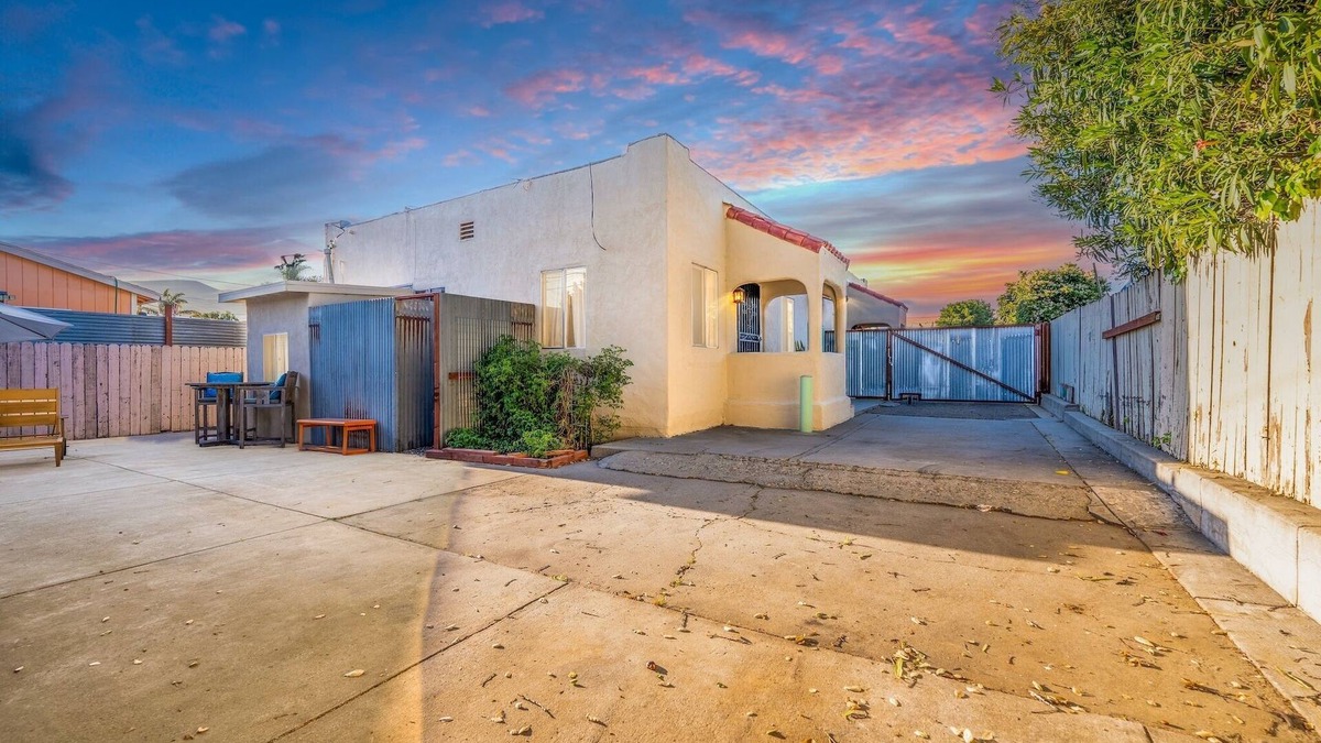 Ventura House | This charming two-bedroom, one-bath duplex is your ideal coastal retreat, offering an authentic beach town experience just a short distance from the water.