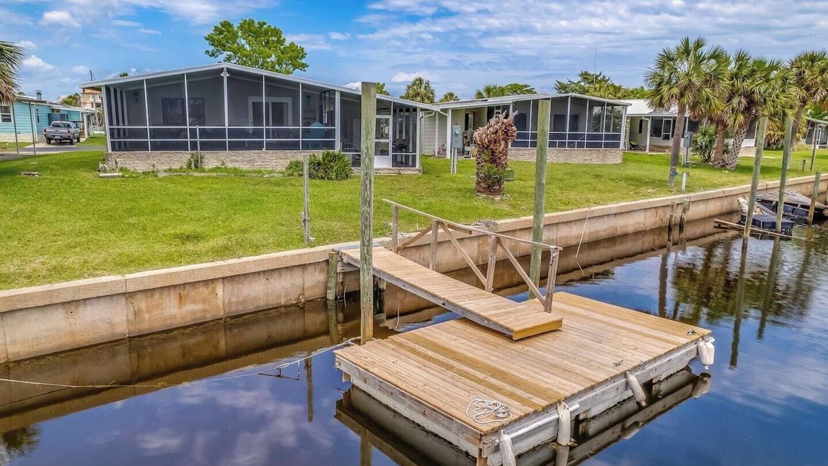 Crawfordville House | This popular 3 BR/2 BA home sits on a canal in the gated community of Paradise Village