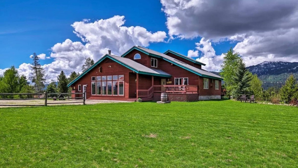 Tamarack Resort Apartment | This private riverfront escape near McCall sleeps 22+! Bar/game room, huge kitchen/dining. Between Tamarack & Brundage, with ride-out snowmobile trail access. Cozy fireplace & big TVs for sports fans.