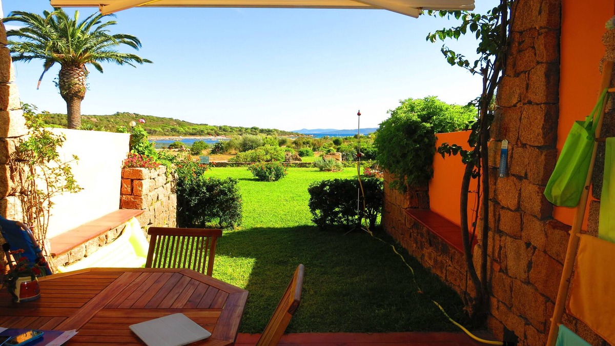 San Teodoro Apartment | Three-room garden apartment with sea view, 200m from Salina Bamba and 800m from Cala Brandinchi
