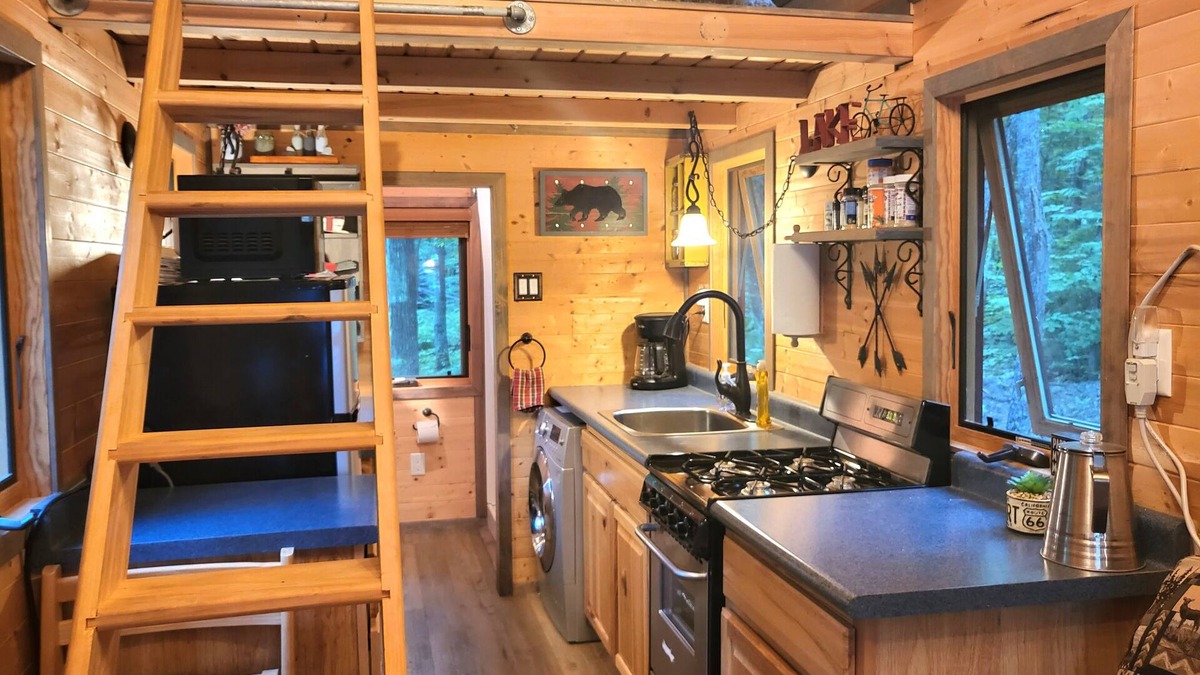 Nevis House | Tiny bungalow secluded in the woods with lake view. Pets accepted!