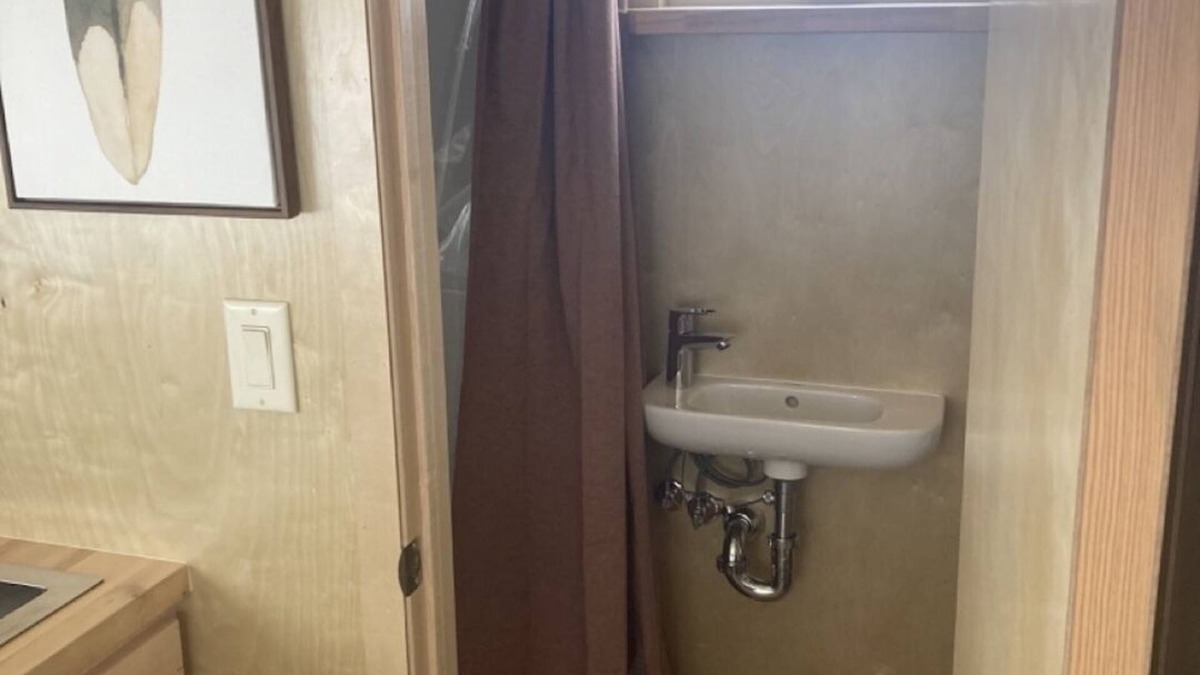 Montrose House | Tiny home with one queen bed.