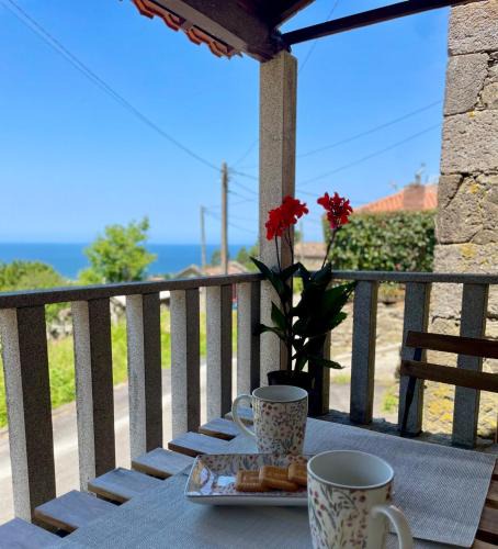 Oia House | Tiny house with sunset over the ocean