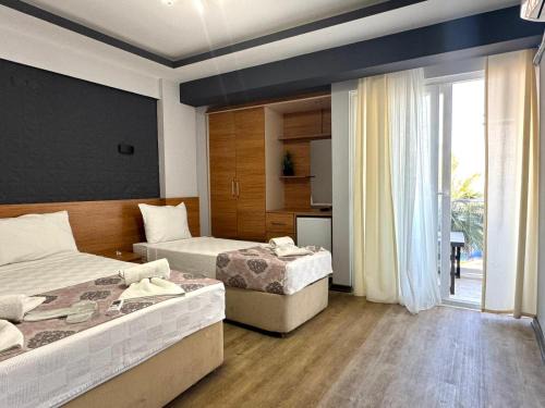 Camlık Mahallesi Hotel | Titanium Hotel Didim