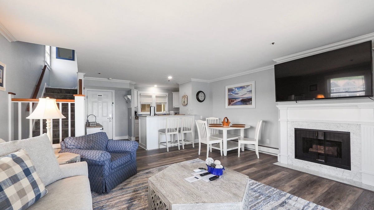 Boyne City Condo | Top-Floor Lake Charlevoix Condo | Private Beach Access | Gas-Log Fireplace