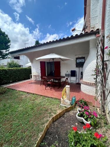 Villaggio Taunus House | Tra la luna e il mare - delizioso appartamento con giardino nella riviera del conero per un soggiorno felice