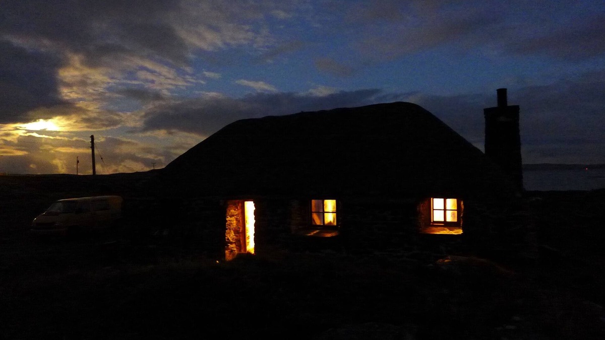 Outer Hebrides Cottage | Traditional stone and thatch cottage on the waters edge with beautiful sea views