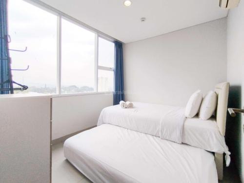 Dago Apartment | Tranquil Designed 2BR Apartment Dago Suites By Travelio
