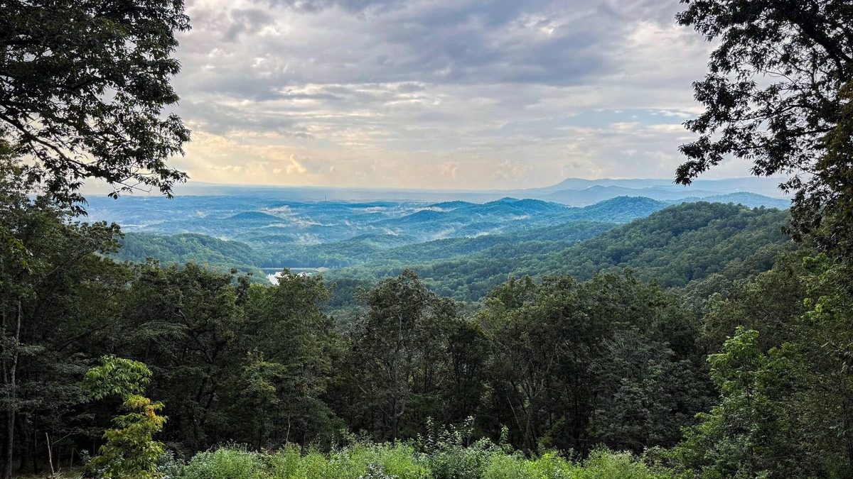 Ranger Cabin | Tranquil Escape: Hot Tub, Scenic Views, Family Fun