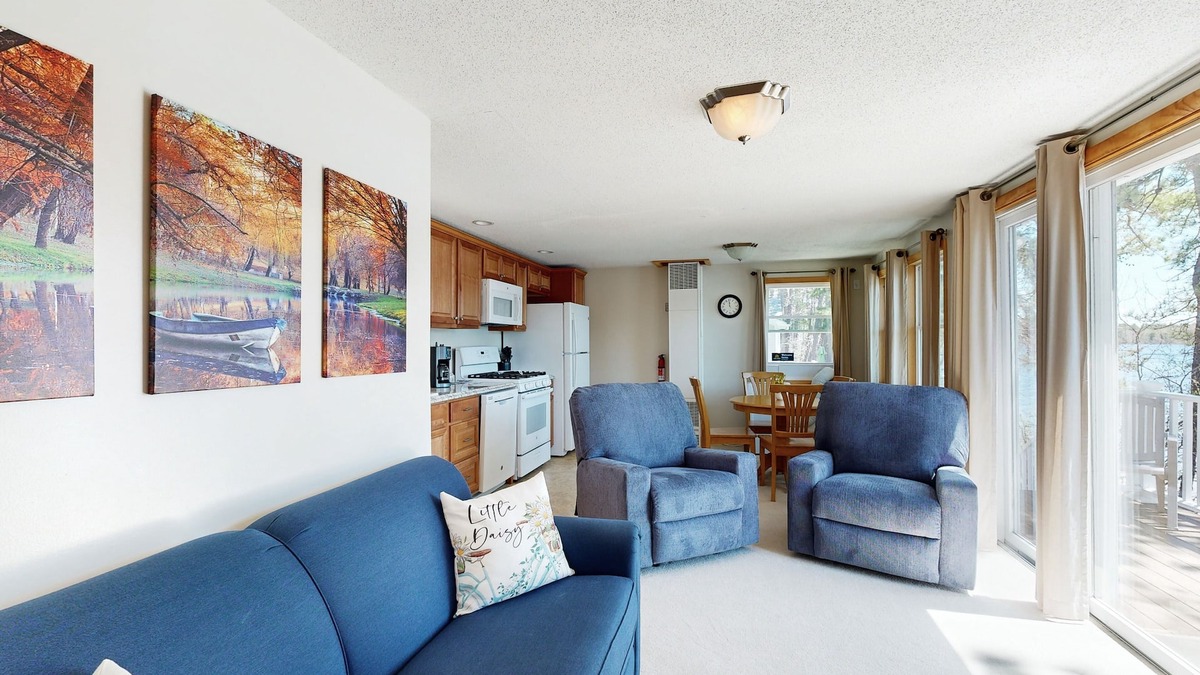 The Bays Cottage | Tranquil lakefront cottage with private beach, boat slip & fishing kayak access