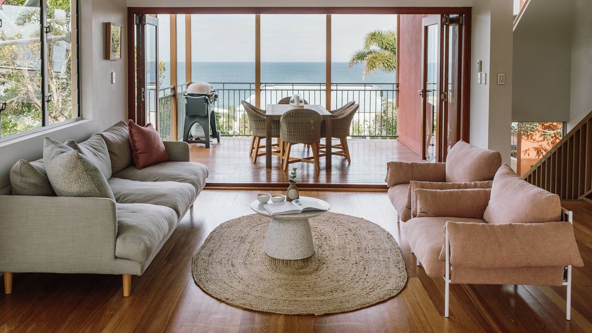 Sunrise Beach Apartment | Tranquil Treetop Retreat with Pool and Ocean Views