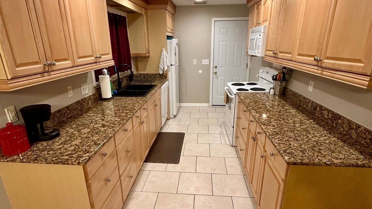 North Forest Hills House | Travelers Abode- Large fully fenced in yard & peaceful neighborhood