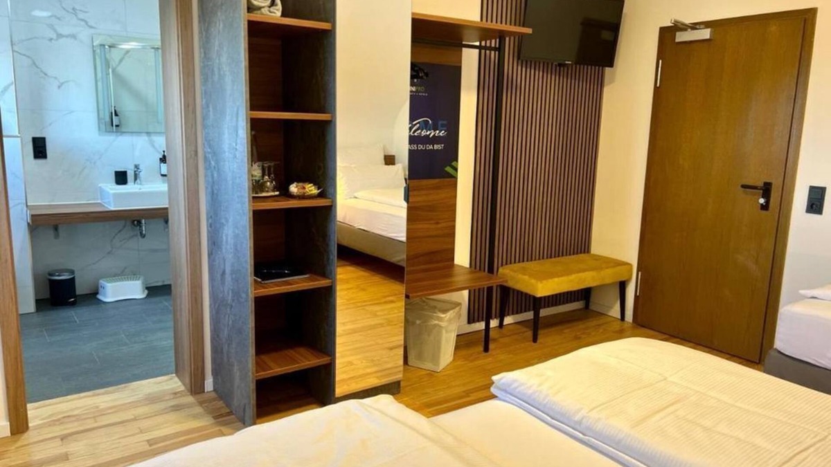 Weiskirchen Apartment | Triple room - JUNIPRO Hotel Schinderhannes