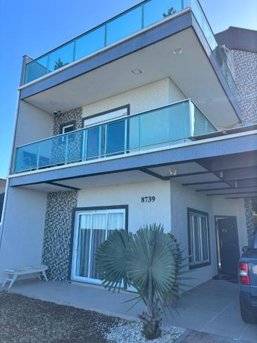 Matinhos House | Triplex de Frente para o Mar com Piscina Privativa