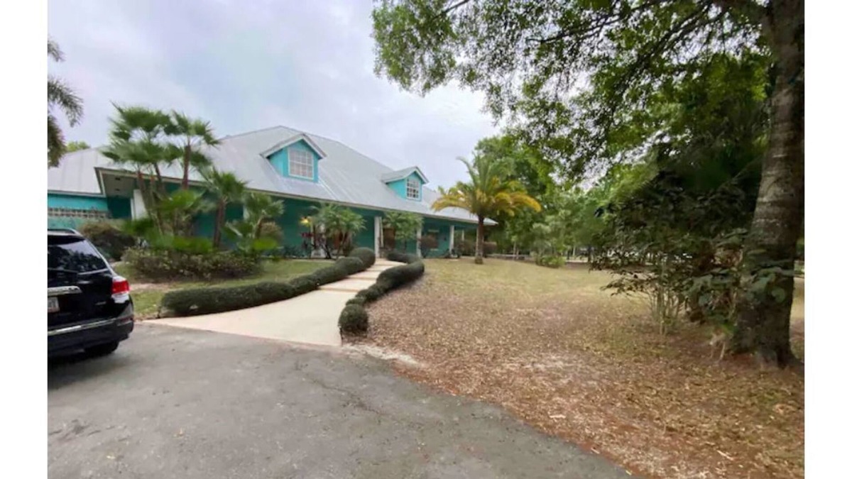 Palm City House | Tropic Retreat! Pool, 3 acres, pond, 4500sq ft