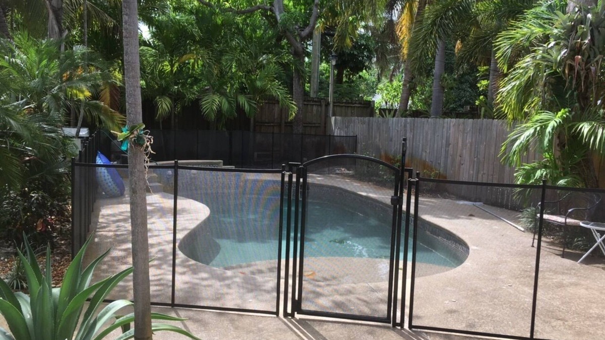 Mango Groves Cottage | Tropical Heated Pool home in fun beach side town Sleeps 8 Private