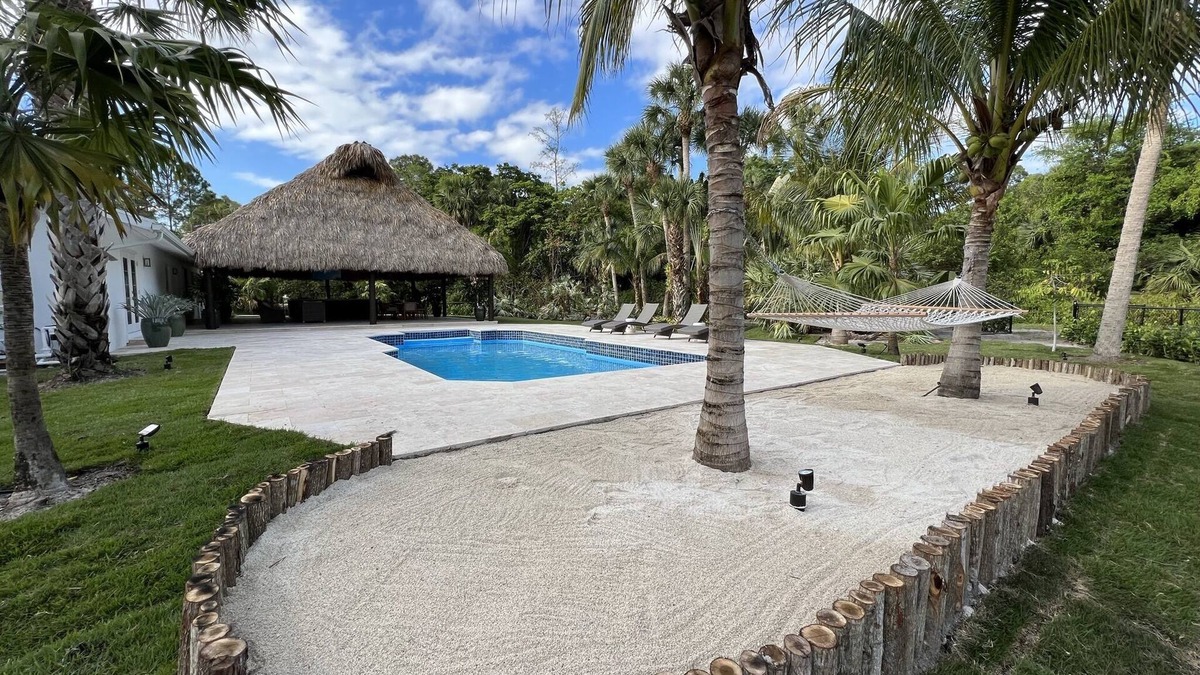 Greenacres House | Tropical oasis with amazing tiki