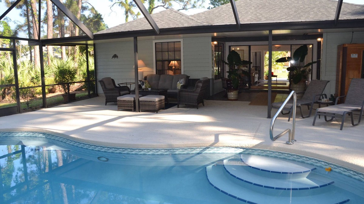 Palm City House | Tropical Paradise! Heated Pool & Sauna. Large very private yard. Near Everything