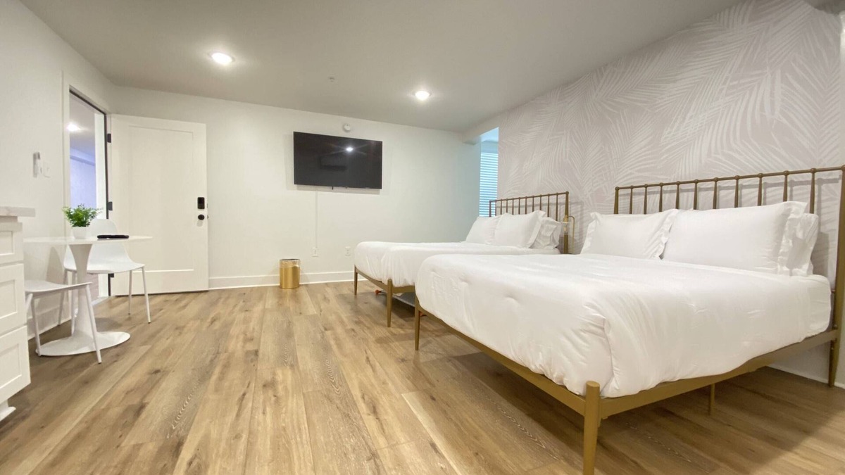 Galveston Apartment | Tropical Springs Studio with Two Full Beds