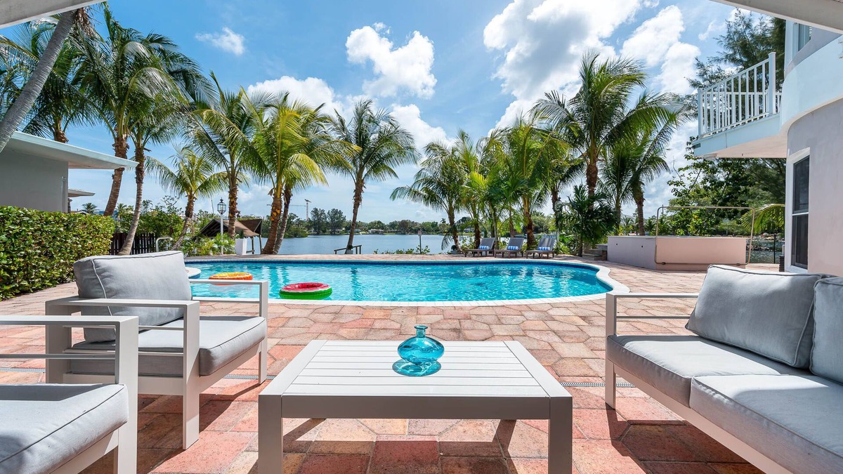 Ojus House | Tropical Waterfront Family Oasis - Heated Pool - Near the Beach & Aventura Mall!