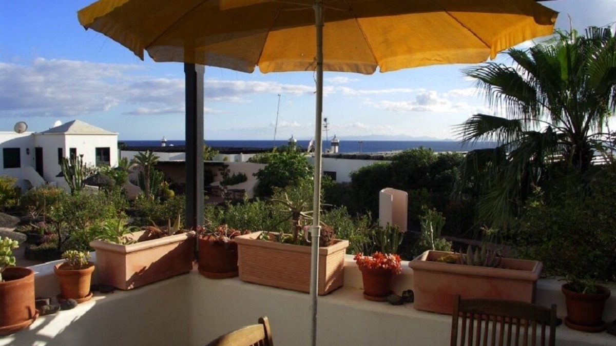 Puerto del Carmen Apartment | Tropicana with sea view and garden dream! Close to the beach (only 150 m)!