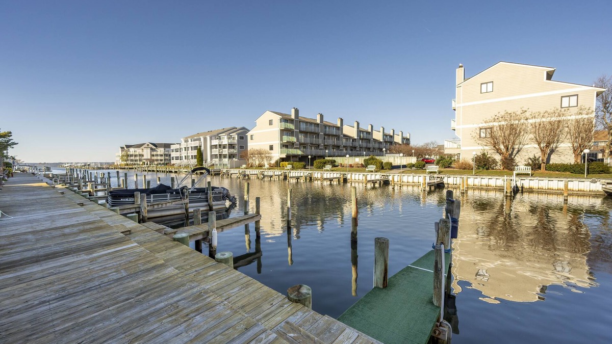 Heron Harbour Isle Condo | Two bedroom. 2 bath bayside condo with outdoor pool and private courtyard
