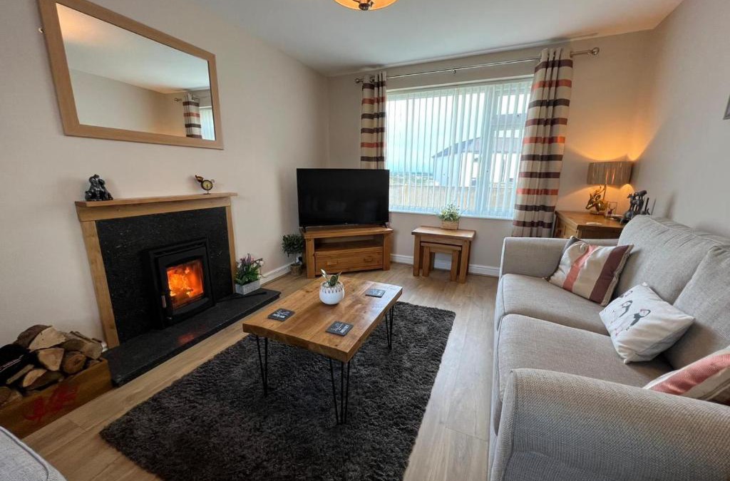 Caergeiliog House | Two bedroom house with enclosed gardens and 2 car drive