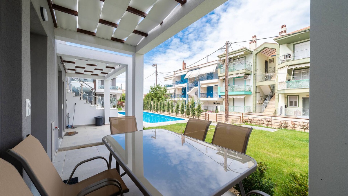Paralia Ofryniou Villa | Two - Bedroom Loft with Pool Access, in Perla Residential Complex